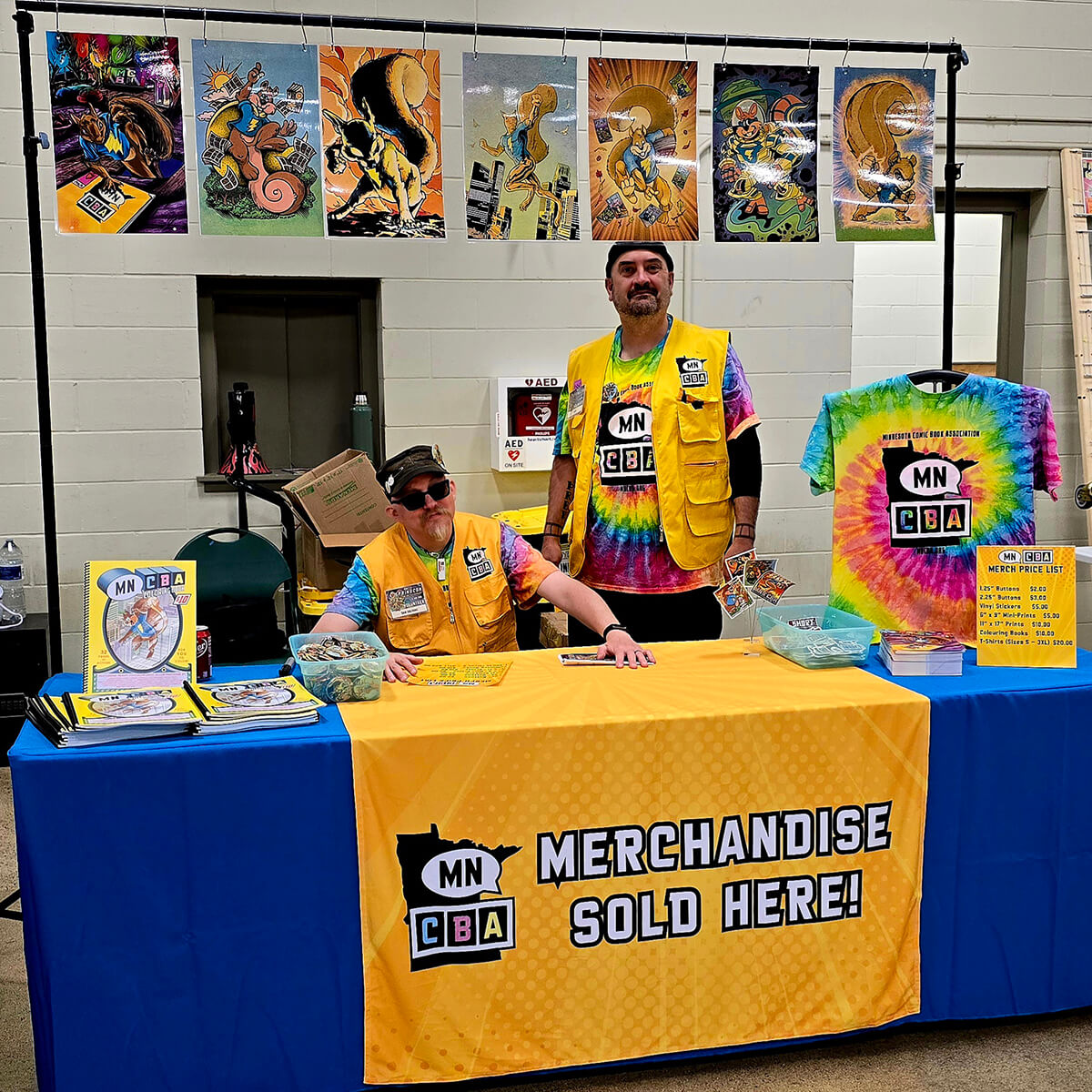 Dan Bateman and Nick Palodichuk at MNCBA SpringCon 2026 Merchandise Table volunteers at prize table